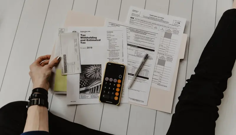 Financial advisor reviewing portfolio data with client